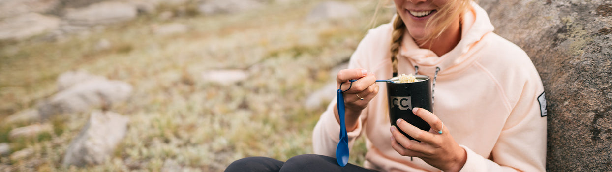 eating breakfast at camp