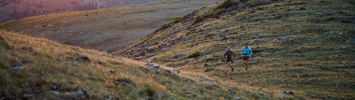 runners in the high alpine