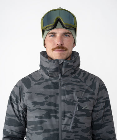 on-model image of strafe outerwear fall/winter 23/24 collection mens hayden jacket in distressed stealth camo