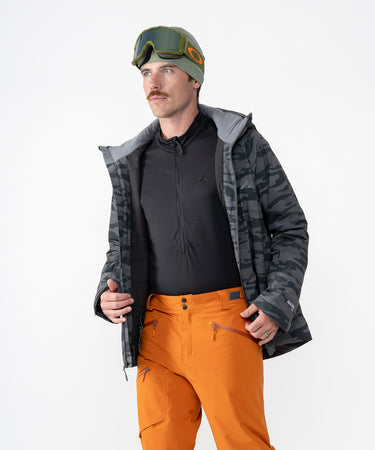 on-model image of strafe outerwear fall/winter 23/24 collection mens hayden jacket in distressed stealth camo