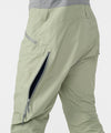 on-model image of strafe outerwear fall/winter 23/24 collection mens nomad bib pant in moss