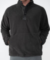 on-model image of strafe outerwear fall/winter 23/24 collection mens ajax snap fleece mid-layer in black