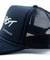 strafe outerwear fall/winter 23/24 collection ski fast trucker hat in new navy 