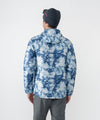 on-model image of strafe outerwear fall/winter 23/24 collection mens aero insulator in blue tie dye