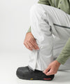 studio on-model image of strafe outerwear 2023 summit 2l insulated pant in frost grey color