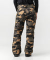 studio on-model image of strafe outerwear 2023 pika  2l insulated pant in dune camo color