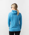 studio on-model image of strafe outerwear 2023 ws basecamp hoodie in cobalt color