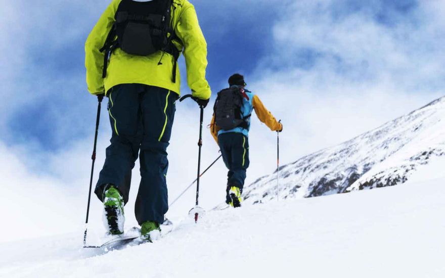 Two skiers on a tour.
