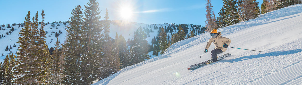 skier carving in pyramid jacket