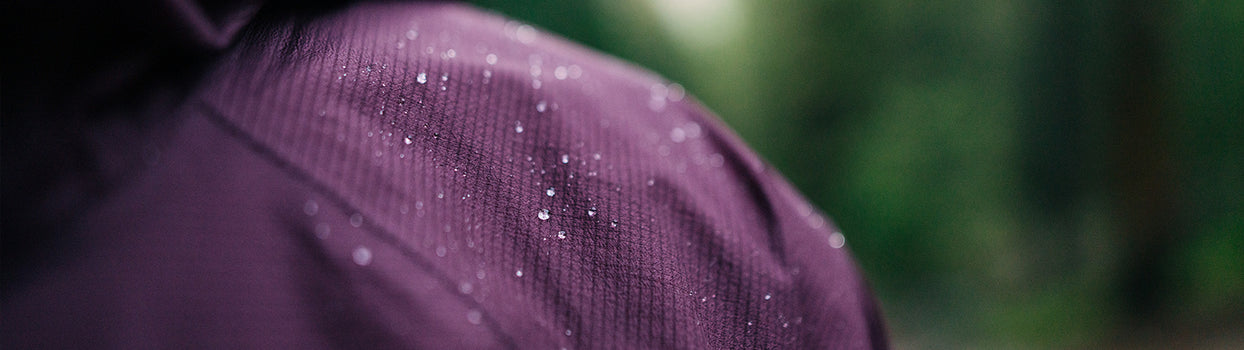 hikers blurred by rain