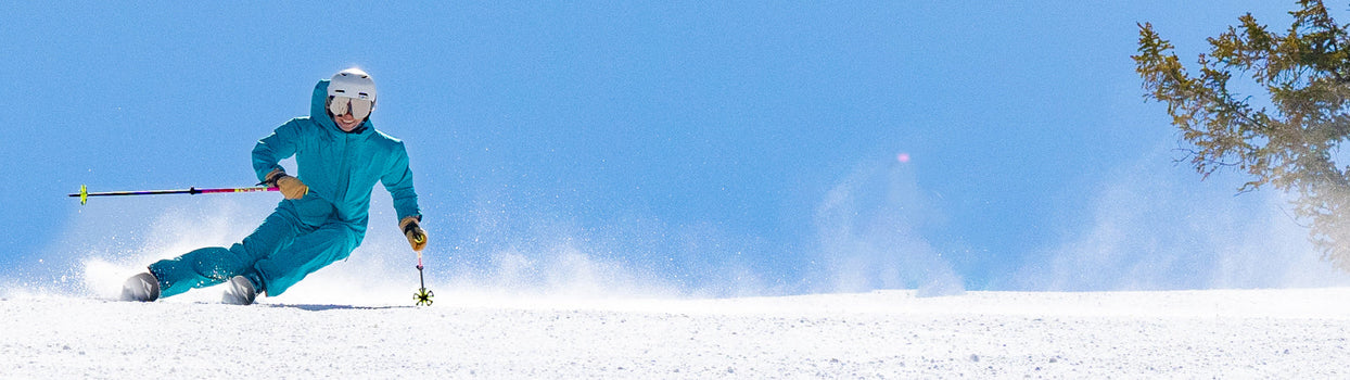 female skier in cloud 9 kit