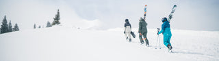group of three people hiking