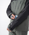 on-model image of strafe outerwear fall/winter 23/24 collection mens pyramid jacket in charcoal