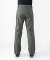 on-model image of strafe outerwear fall/winter 23/24 collection men&#39;s capitol pant in charcoal