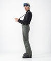 on-model image of strafe outerwear fall/winter 23/24 collection men&#39;s capitol pant in charcoal