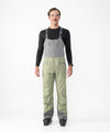 on-model image of strafe outerwear fall/winter 23/24 collection mens nomad bib pant in moss