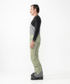 on-model image of strafe outerwear fall/winter 23/24 collection mens nomad bib pant in moss