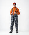 on-model image of strafe outerwear fall/winter 23/24 collection mens sickbird suit in blackout tie dye