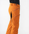 on-model image of strafe outerwear fall/winter 23/24 collection mens summit pant in amber