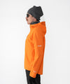 on-model image of strafe outerwear fall/winter 22/23 collection cham pullover in tangerine