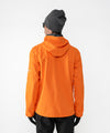 on-model image of strafe outerwear fall/winter 22/23 collection cham pullover in tangerine