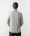 studio on-model image of strafe outerwear 2023 ms basecamp half zip in frost grey color