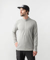 studio on-model image of strafe outerwear 2023 ms basecamp half zip in frost grey color
