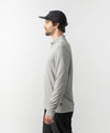 studio on-model image of strafe outerwear 2023 ms basecamp half zip in frost grey color