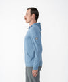 on-model image of strafe outerwear fall/winter 23/24 collection mens basecamp full zip baselayer in storm cloud blue