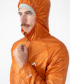 on-model image of strafe outerwear fall/winter 23/24 collection mens ultralight aero hooded insulator in amber