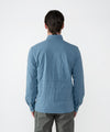 on-model image of strafe outerwear fall/winter 23/24 collection mens highlands shirt jacket in storm cloud blue