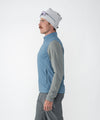 on-model image of strafe outerwear fall/winter 23/24 collection mens temerity vest in storm cloud blue
