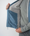 on-model image of strafe outerwear fall/winter 23/24 collection mens temerity vest in storm cloud blue