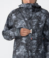 on-model image of strafe outerwear fall/winter 23/24 collection women&#39;s meadow jacket in blackout tie dye