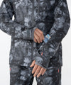 on-model image of strafe outerwear fall/winter 23/24 collection women&#39;s meadow jacket in blackout tie dye