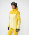 on-model image of strafe outerwear fall/winter 23/24 collection women&#39;s meadow jacket in lemon