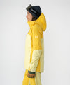 on-model image of strafe outerwear fall/winter 23/24 collection women&#39;s meadow jacket in lemon