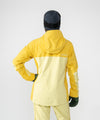 on-model image of strafe outerwear fall/winter 23/24 collection women&#39;s meadow jacket in lemon