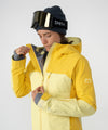 on-model image of strafe outerwear fall/winter 23/24 collection women&#39;s meadow jacket in lemon