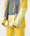 on-model image of strafe outerwear fall/winter 23/24 collection women&#39;s meadow jacket in lemon