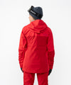 on-model image of strafe outerwear fall/winter 23/24 collection women&#39;s lynx pullover in cherry red