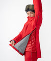 on-model image of strafe outerwear fall/winter 23/24 collection women&#39;s lynx pullover in cherry red