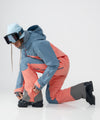 on-model image of strafe outerwear fall/winter 23/24 collection womens sickbird suit in sunset