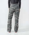 on-model image of strafe outerwear fall/winter 23/24 collection womens pika pant in distressed moss camo