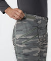 on-model image of strafe outerwear fall/winter 23/24 collection womens pika pant in distressed moss camo