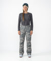 on-model image of strafe outerwear fall/winter 23/24 collection womens pika pant in distressed moss camo