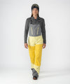 on-model image of strafe outerwear fall/winter 23/24 collection womens scarlett bib pant in lemon