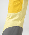 on-model image of strafe outerwear fall/winter 23/24 collection womens scarlett bib pant in lemon