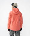 on-model image of strafe outerwear fall/winter 23/24 collection women&#39;s lucky jacket in sunset