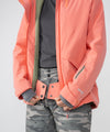 on-model image of strafe outerwear fall/winter 23/24 collection women&#39;s lucky jacket in sunset